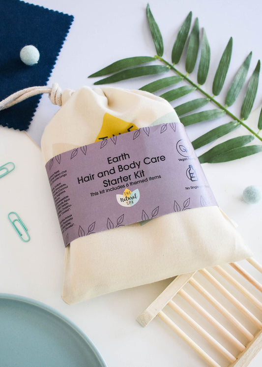 Complete plastic-free Earth hair and body care gift set with solid bars, bamboo washcloth and cotton bag.