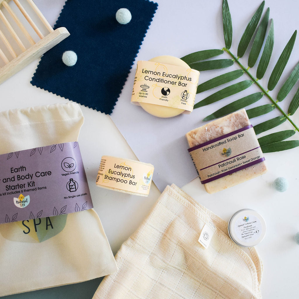Vegan Earth hair and body starter kit with three solid bars and reusable cotton bag, eco-friendly and handmade.