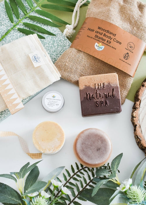 Handmade plastic-free Woodland hair and body starter kit with reusable cotton bag and solid care bars.