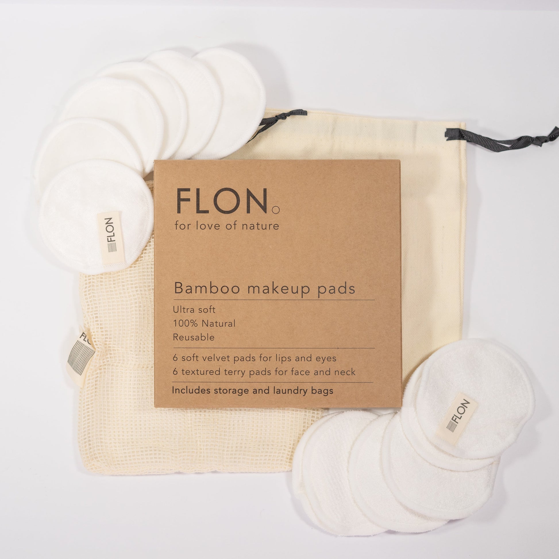 Reusable bamboo makeup remover pads set with mesh bag and packaging labeled ‘FLON’ on a light background.