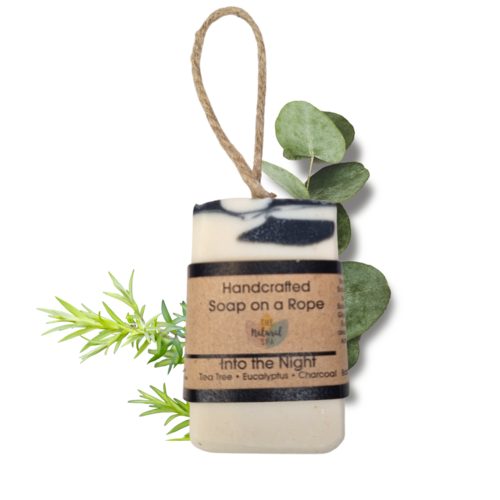 Handmade Into the Night soap bar with eucalyptus, tea tree and charcoal, plastic-free with hanging cord.
