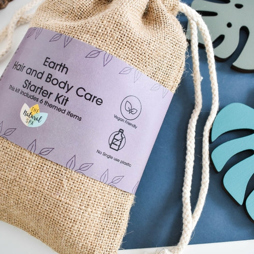 Zero-waste Earth hair and body starter kit styled with natural elements, vegan and cruelty-free.