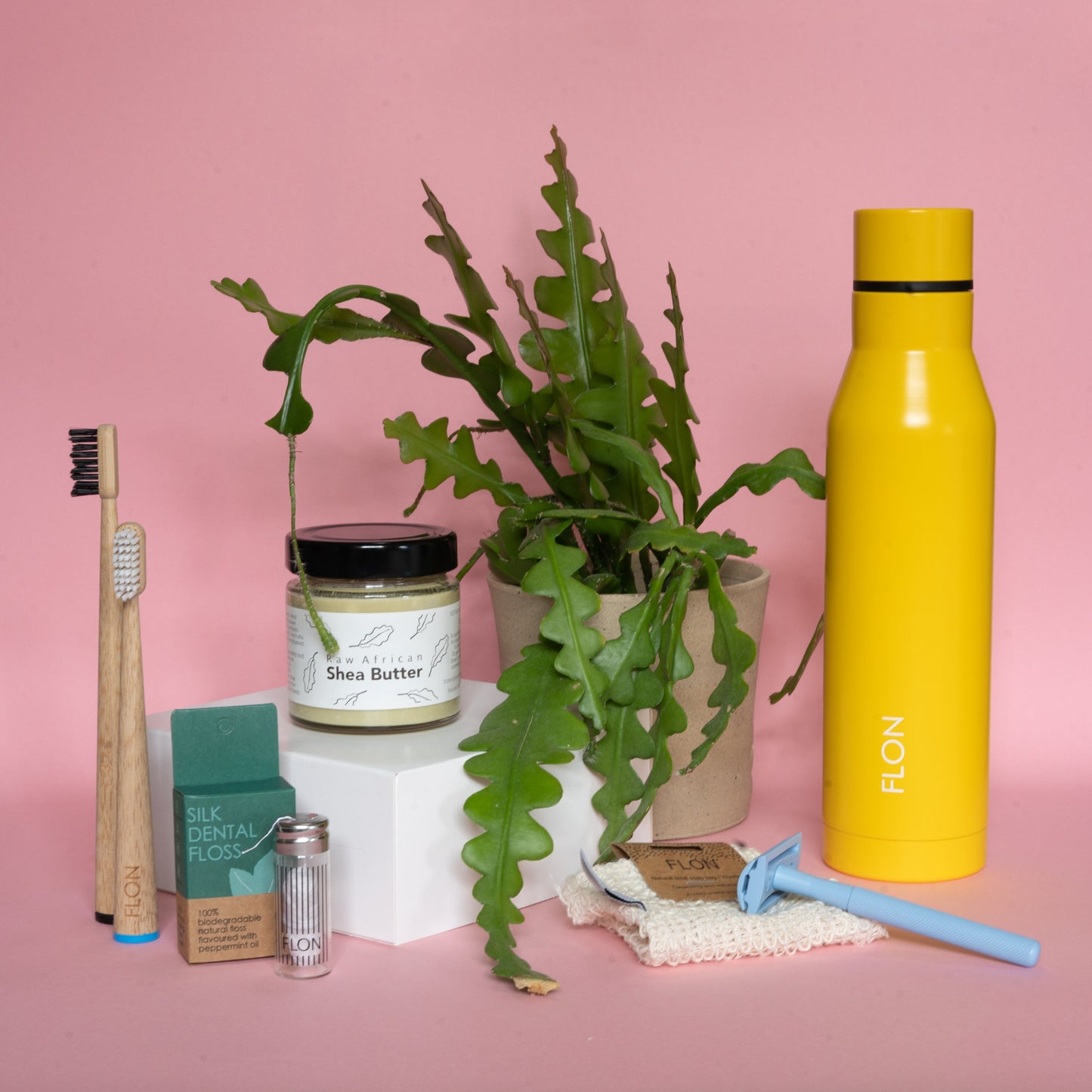 Reusable brass safety razor with sustainable grooming accessories and zero-waste packaging.