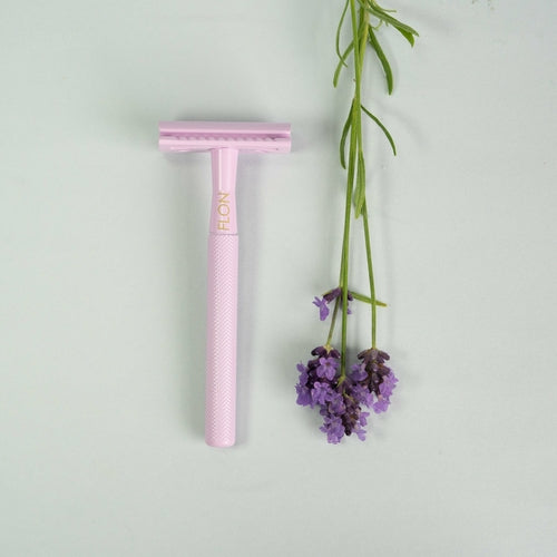 Sustainable brass safety razor in pink with lavender, zero-waste and reusable.