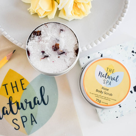 Vegan rose sugar body scrub with natural floral scent and gentle exfoliating texture.