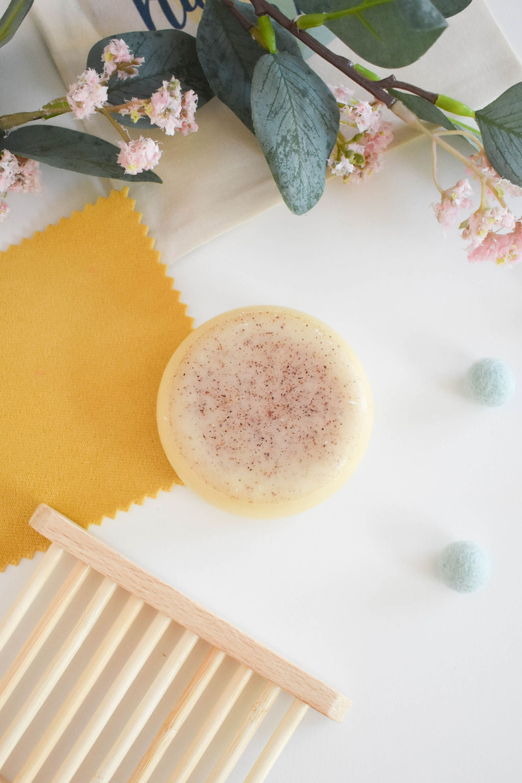 Solid conditioner bar close-up with natural ingredients, vegan and zero-waste.