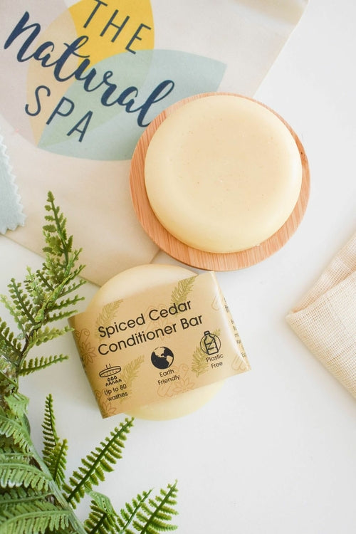 Close-up of spiced cedar conditioner bar with natural decor.